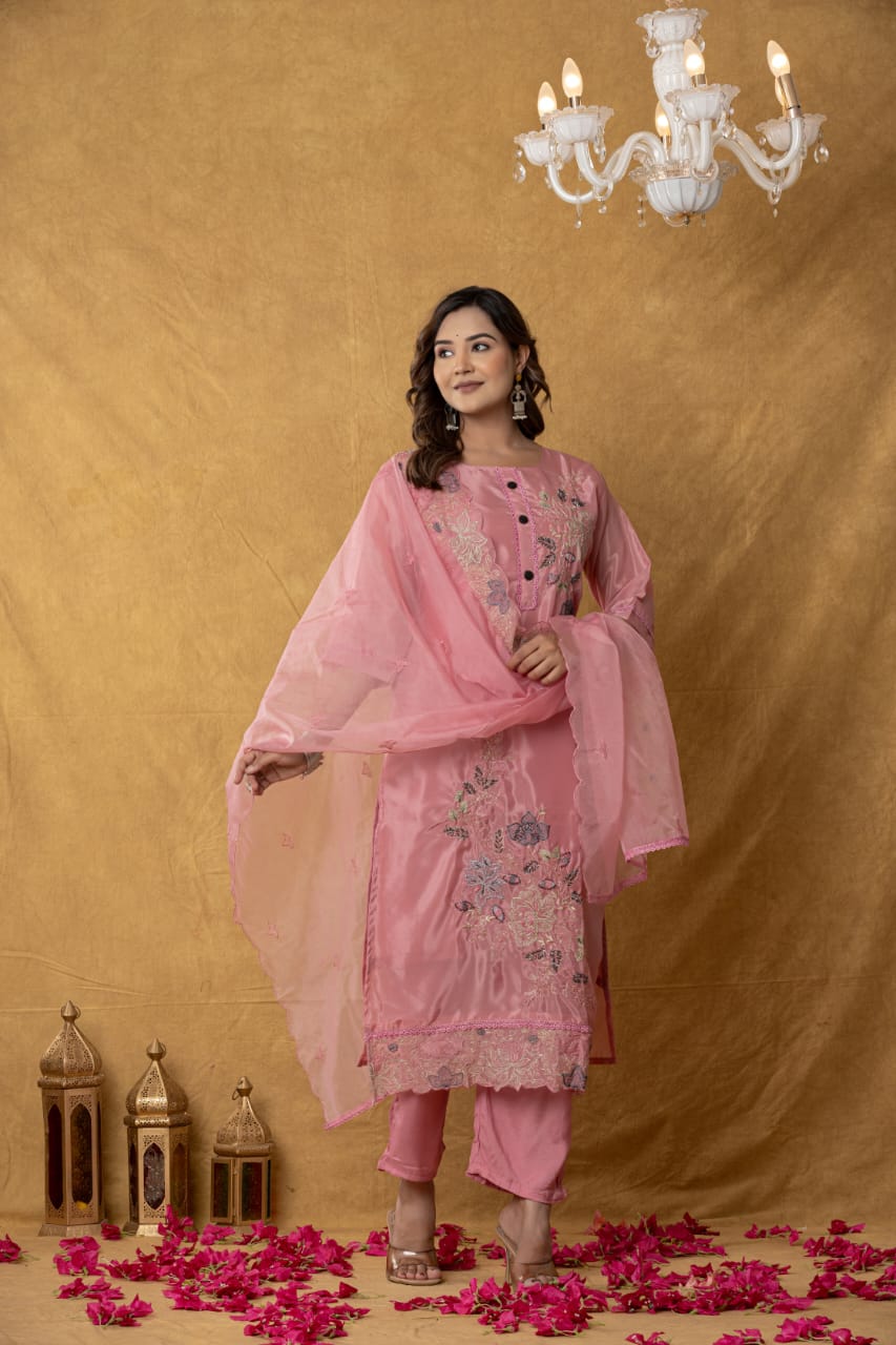 Grace in every thread 🌸 Soft pink elegance for your festive moments.